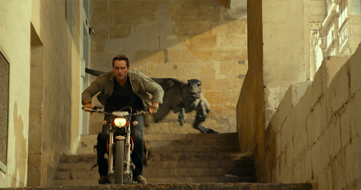 Owen (Chris Pratt) is pursued by a vicious dinosaur in Malta