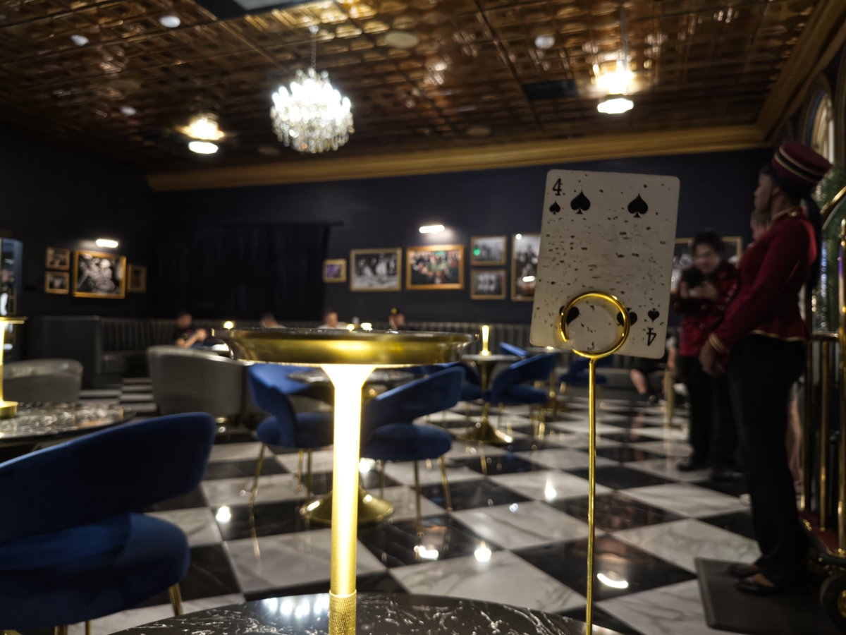 A playing card identifies your group John Wick Experience at Area 15, Las Vegas
