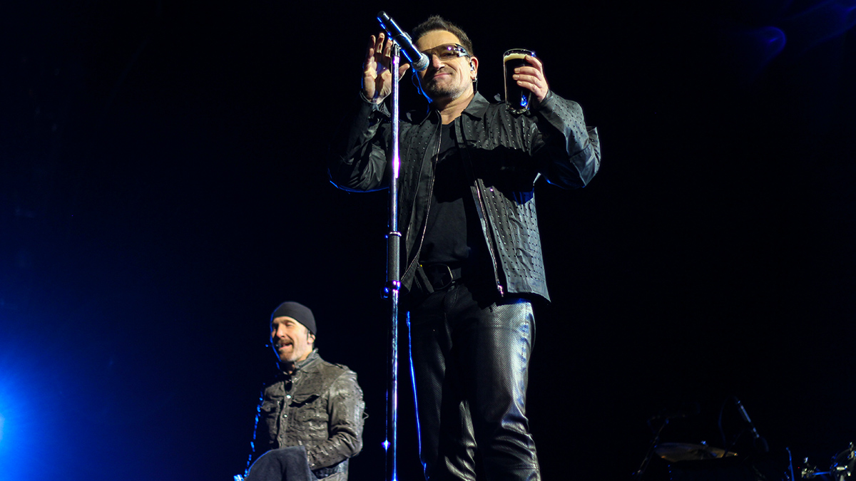 360 Tour U2: Bono with a pint of Guinness, celebrating Amnesty International in Winnipeg