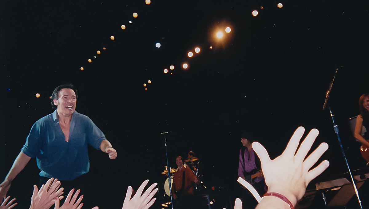 Bruce Springsteen high-fives the crowd in Salt Lake City