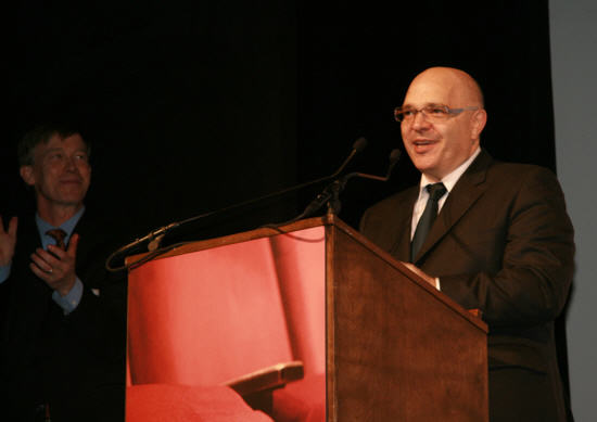 Anthony accepts the Mayor's Career Achievement Award