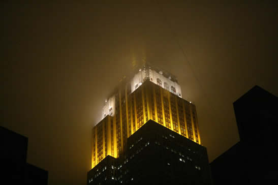 The Empire State Building by the fog of night