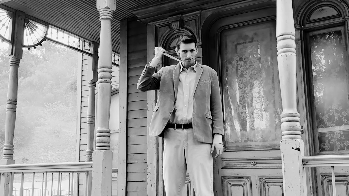 Norman Bates wields a knife and prepares to pounce