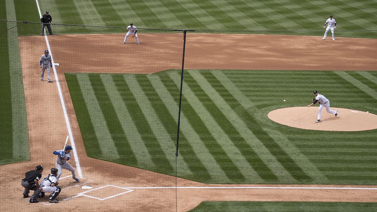 Kyle Freeland throws a pitch